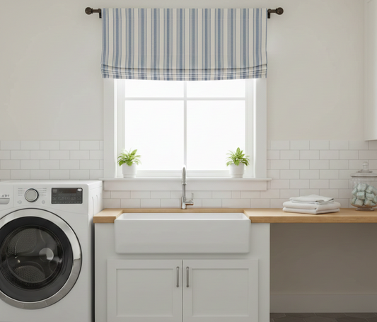 Laundry room with a striped mock roman shade valance above the sink